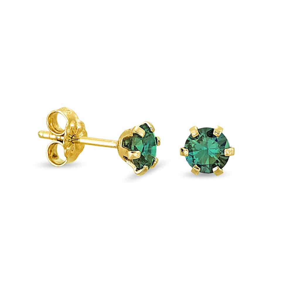 Gold earrings with green zircon